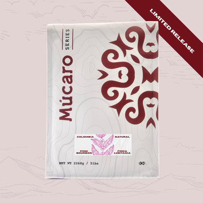 A package of Mucaro Series coffee beans, featuring a white bag with a dark red tribal pattern and text. The package is set against a light pink background with faint mountain illustrations, and a dark red diagonal banner in the top right corner reads 'LIMITED RELEASE'.