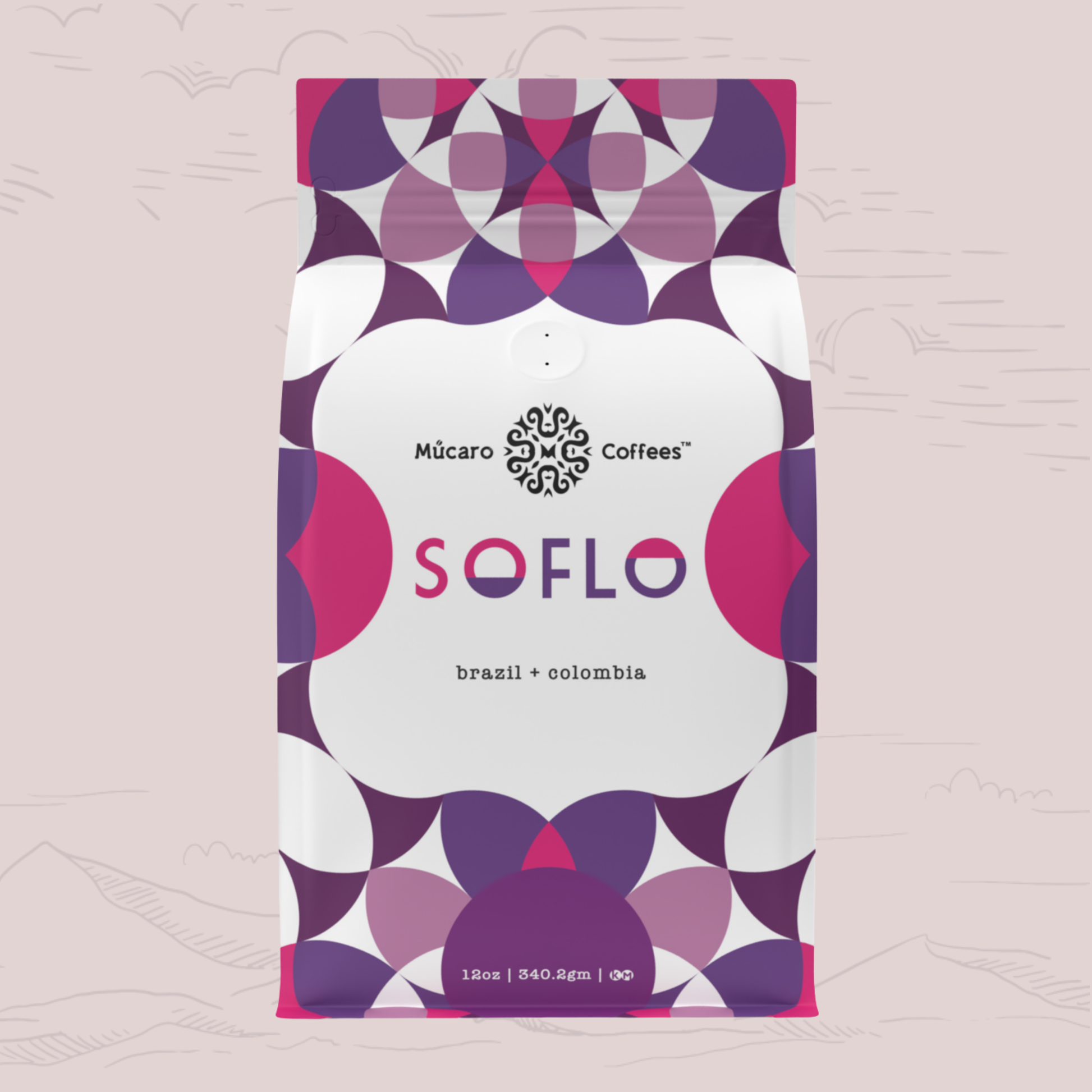 A 12oz bag of Múcaro Coffees Soflo Blend from Colombia and Brazil, featuring a modern geometric pattern in purple, magenta, and white on a light pink background.